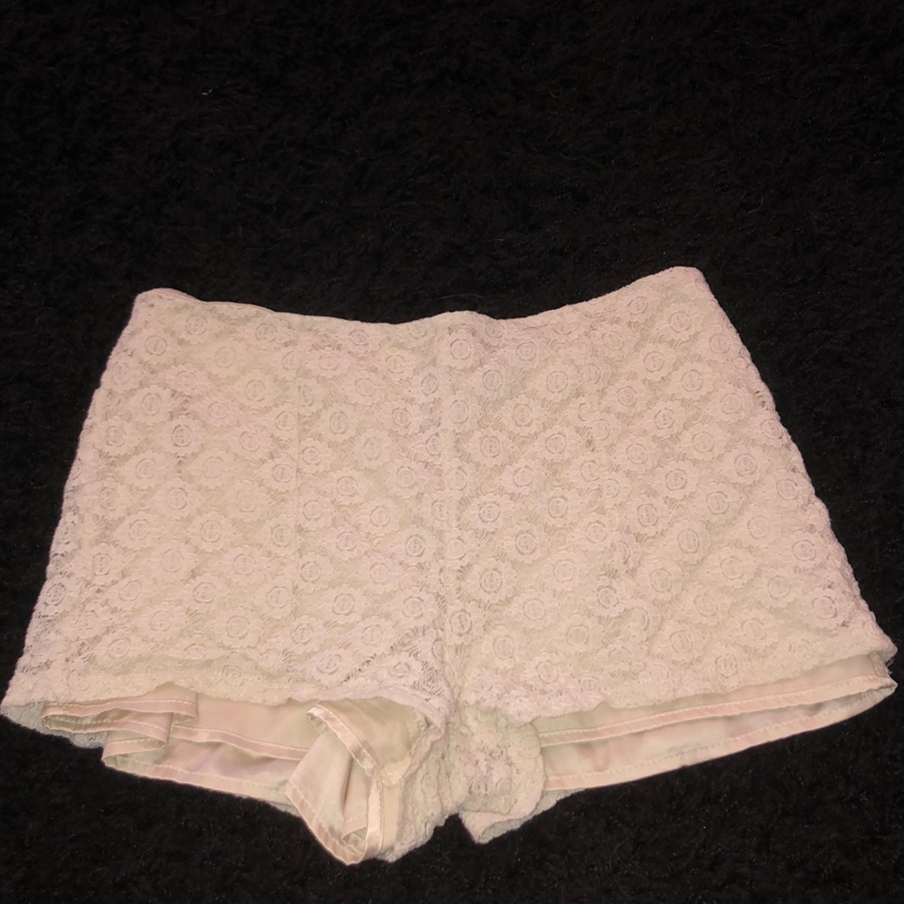 Floral textured white shorts